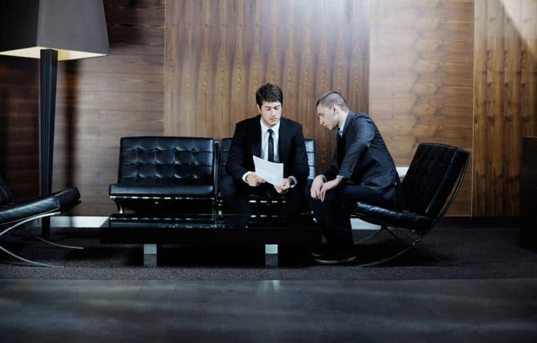 business people in lobby having a meeting