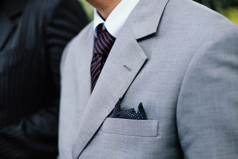 close up of man in a grey suit